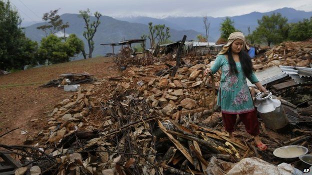 Salvaging water vessels in Gorkha. [Photo by BBC.]