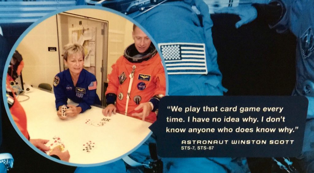 Astronaut Winston Scott’s comments about the card game played by all American astronauts before launch.
