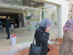 Tear gas and damage to the Al Quds University Science building resulting from  an Israeli raid in 2013. Photo by Rima Najjar.