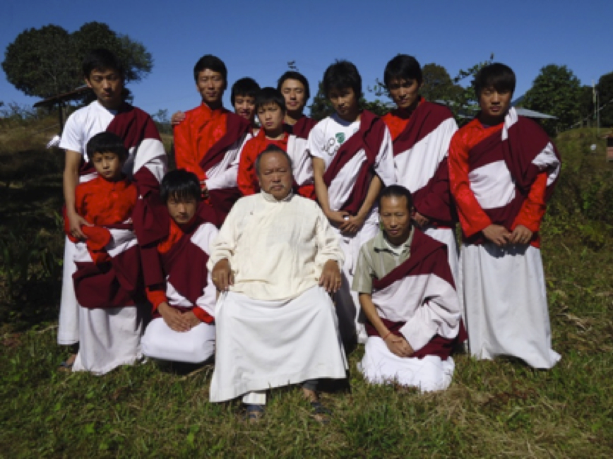 Lopon P. Ogyan Tandzin Rinpoche (front), a ngakpa and student of Dudjom Rinpoche with students from the ngakpa school or dratsang which he founded in 2001 and which is located in a remote border region of Arunachal Pradesh, India